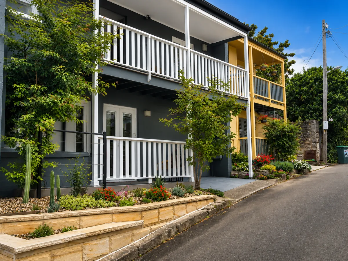 Two-storey Glebe home with restored balcony and double-glazed entrance doors