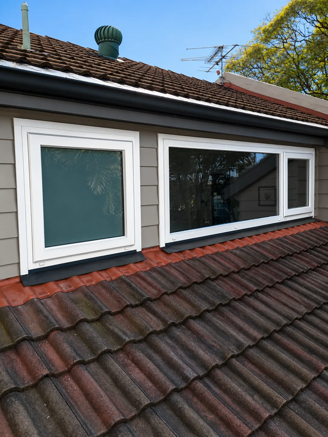 New double-glazed window systems integrated with the existing roof and exterior at Glebe